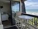 Bedroom with balcony access and partial ocean view at 201 76Th Ave. N # C3, Myrtle Beach, SC 29572