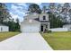 Two story house with a two car garage and landscaped lawn at 120 Carolina Lakes Blvd., Myrtle Beach, SC 29588