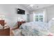 Bright bedroom with a king-size bed and access to a private patio at 647 Riverward Dr. # 647, Myrtle Beach, SC 29588