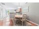 Bright dining area with kitchen views, hardwood floors at 647 Riverward Dr. # 647, Myrtle Beach, SC 29588