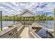 Wooden community dock with seating and gazebo at 647 Riverward Dr. # 647, Myrtle Beach, SC 29588