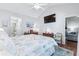 Comfortable bedroom with a king-size bed and views of the living room at 647 Riverward Dr. # 647, Myrtle Beach, SC 29588