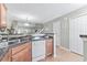 Kitchen with a breakfast bar, dark countertops, and stainless steel appliances at 647 Riverward Dr. # 647, Myrtle Beach, SC 29588