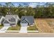 Aerial view of two houses and surrounding area at 2445 Campton Loop, Conway, SC 29527