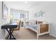 Cozy bedroom with daybed, desk, and coastal-themed decor at 289 Sandridgebury Dr. # 65, Little River, SC 29566