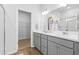Bathroom with double vanity and walk-in shower at 289 Sandridgebury Dr. # 65, Little River, SC 29566