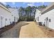 Private backyard with grassy area between two homes at 5895 Cremona Dr., Myrtle Beach, SC 29577