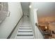 View of a staircase with dark wood railings and white risers at 852 Iris St. # F, Myrtle Beach, SC 29577