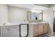 Bathroom with a walk-in bathtub and double vanity at 4301 S Ocean Blvd. # 1C, North Myrtle Beach, SC 29582
