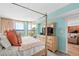 Ocean view bedroom with king-size bed and ensuite bathroom at 4301 S Ocean Blvd. # 1C, North Myrtle Beach, SC 29582