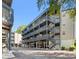 Exterior view of a multi-story building with parking and stairs at 1500 Cenith Dr. # B-402, North Myrtle Beach, SC 29582