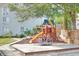 playground with swings, slide, and climbing structure at 351 Lake Arrowhead Rd. # 4-315, Myrtle Beach, SC 29572
