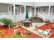 Inviting courtyard with seating area, landscaping, and red mulch at 351 Lake Arrowhead Rd. # 4-315, Myrtle Beach, SC 29572