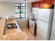 Efficient kitchen with white appliances and granite countertops at 351 Lake Arrowhead Rd. # 4-315, Myrtle Beach, SC 29572