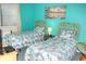 Bedroom with two twin beds, beach-themed decor at 351 Lake Arrowhead Rd. # 4-315, Myrtle Beach, SC 29572