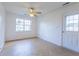 Bright dining area with tile floor, ceiling fan, and exterior access at 8089 Bark Ct., Murrells Inlet, SC 29576