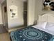 Cozy bedroom with a mandala-print bedspread and white bedding at 1207 S Ocean Blvd. # 50405, Myrtle Beach, SC 29577
