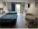 Bedroom with two double beds, dresser, and small table at 1207 S Ocean Blvd. # 50405, Myrtle Beach, SC 29577