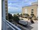 View from balcony showcases ocean, beach, and palm trees at 1207 S Ocean Blvd. # 50405, Myrtle Beach, SC 29577