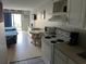 Studio unit with twin beds, a small kitchen, and dining area at 1207 S Ocean Blvd. # 50405, Myrtle Beach, SC 29577