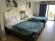 Bedroom with two double beds, and access to balcony at 1207 S Ocean Blvd. # 50405, Myrtle Beach, SC 29577