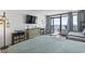 Ocean view bedroom with a comfortable bed, TV and balcony access at 201 74Th Ave. N # 2341, Myrtle Beach, SC 29572