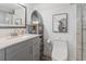 Bathroom with gray vanity, toilet and shower at 201 74Th Ave. N # 2341, Myrtle Beach, SC 29572