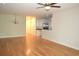 Open living room and kitchen area with hardwood floors at 35 Delray Dr. # 2-C, Murrells Inlet, SC 29576