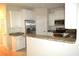 Modern kitchen with granite countertops and stainless steel appliances at 35 Delray Dr. # 2-C, Murrells Inlet, SC 29576