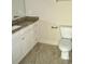 Bathroom with granite countertop and tiled floor at 35 Delray Dr. # 2-C, Murrells Inlet, SC 29576