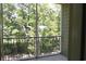 Screened balcony overlooking lush greenery at 35 Delray Dr. # 2-C, Murrells Inlet, SC 29576