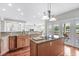 Gourmet kitchen with granite countertops, stainless steel appliances, and water views at 181 Palmetto Harbour Dr., North Myrtle Beach, SC 29582