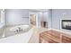 Elegant bathroom with granite vanity, soaking tub and hardwood floors at 181 Palmetto Harbour Dr., North Myrtle Beach, SC 29582