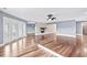 Open living room with hardwood floors, fireplace, and French doors at 181 Palmetto Harbour Dr., North Myrtle Beach, SC 29582