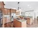 Modern kitchen with granite countertops, stainless steel appliances, and an island at 181 Palmetto Harbour Dr., North Myrtle Beach, SC 29582