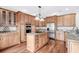Spacious kitchen with granite countertops, stainless steel appliances, and an island at 181 Palmetto Harbour Dr., North Myrtle Beach, SC 29582