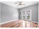 Hardwood floor bedroom with French doors leading to a balcony at 181 Palmetto Harbour Dr., North Myrtle Beach, SC 29582