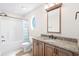 Clean bathroom with a shower/tub combo and granite vanity at 181 Palmetto Harbour Dr., North Myrtle Beach, SC 29582