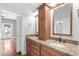 Double vanity bathroom with granite countertop and wood cabinets at 181 Palmetto Harbour Dr., North Myrtle Beach, SC 29582
