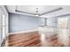 Spacious main bedroom with hardwood floors and a luxurious corner tub at 181 Palmetto Harbour Dr., North Myrtle Beach, SC 29582