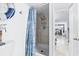 Shower stall with seashell curtain and adjacent living area at 6001 - 1193A S Kings Hwy., Myrtle Beach, SC 29575