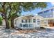 Cute cottage with teal stools on the front porch at 6001 - 1193A S Kings Hwy., Myrtle Beach, SC 29575