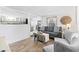 Cozy living room with gray couch and wood floors at 6001 - 1193A S Kings Hwy., Myrtle Beach, SC 29575