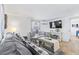 Cozy living room with gray couch and wood floors at 6001 - 1193A S Kings Hwy., Myrtle Beach, SC 29575