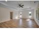 Bright and spacious bedroom with hardwood floors and multiple windows at 205 Brush Ct., Little River, SC 29566