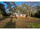 Brick ranch house with mature landscaping at 1763 St. James Rd., Hemingway, SC 29554