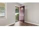 Interior view of the burgundy front door opening to a living area at 2183 Highway 544, Conway, SC 29526