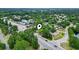 Aerial view showing home location in a residential neighborhood with nearby roads and businesses at 2183 Highway 544, Conway, SC 29526
