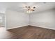Open living room with hardwood floors and neutral walls at 2183 Highway 544, Conway, SC 29526