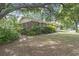 Brick home with mature landscaping and a large front yard at 2183 Highway 544, Conway, SC 29526